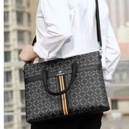 Person holding a gray patterned briefcase with a building in the background