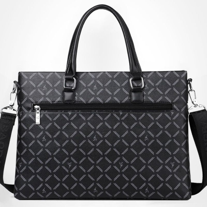 Black patterned handbag with a white background