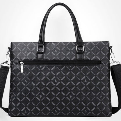 Black patterned handbag with a white background