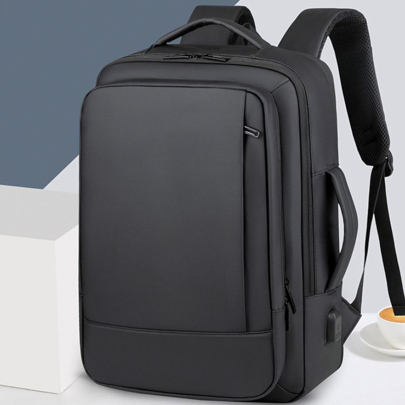 Black backpack on a white background