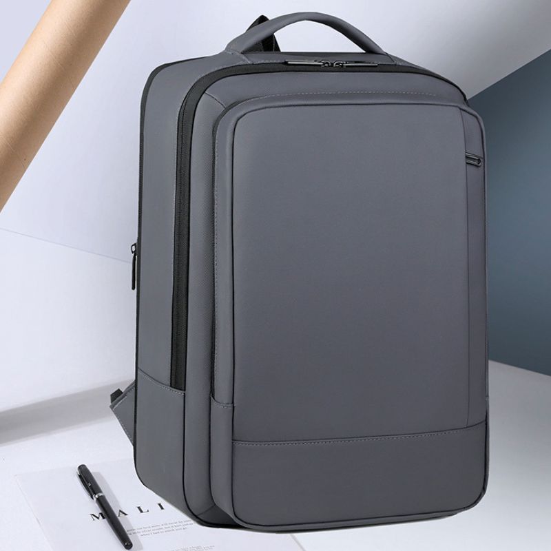Gray backpack on a light gray background