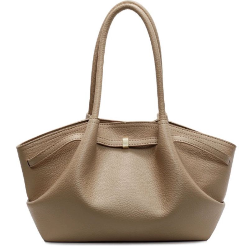 Matte brown color ladies hand bag on white background