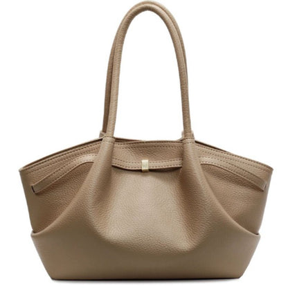 Matte brown color ladies hand bag on white background