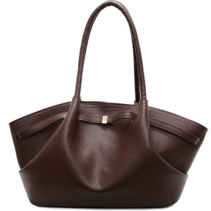 Brown leather handbag on a white background