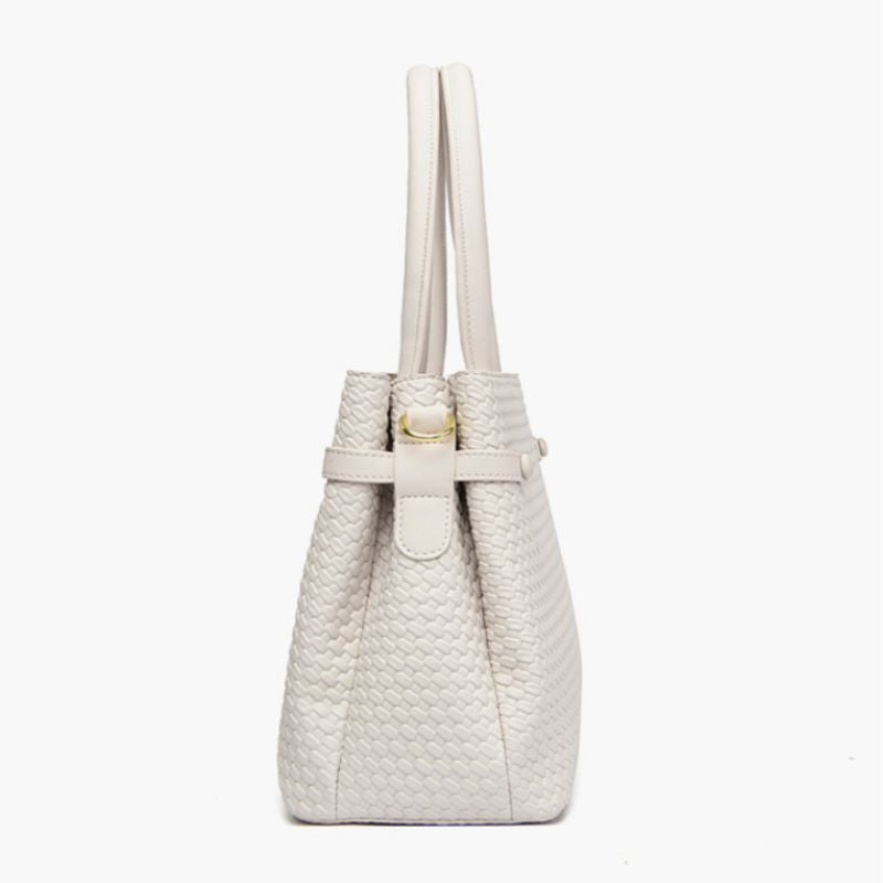 White woven handbag with a gold clasp on a white background